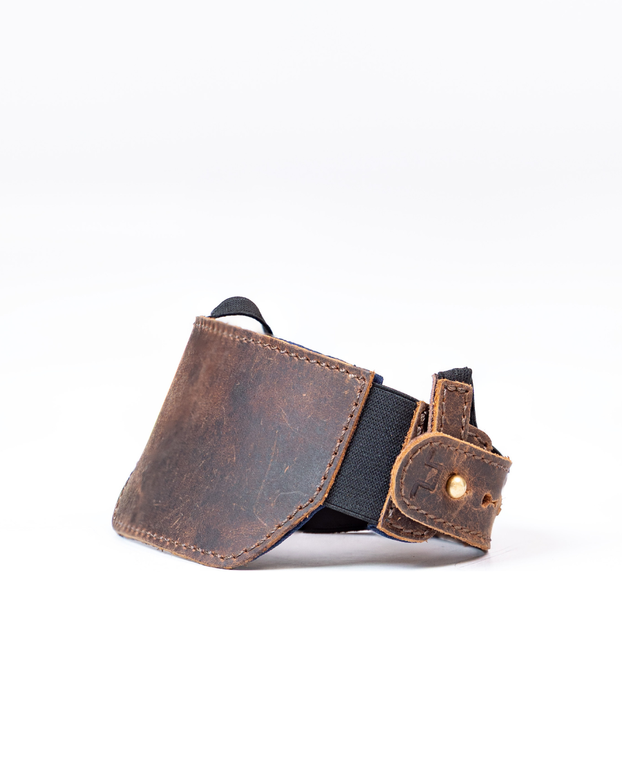 Brown leather shoe protector on a white background