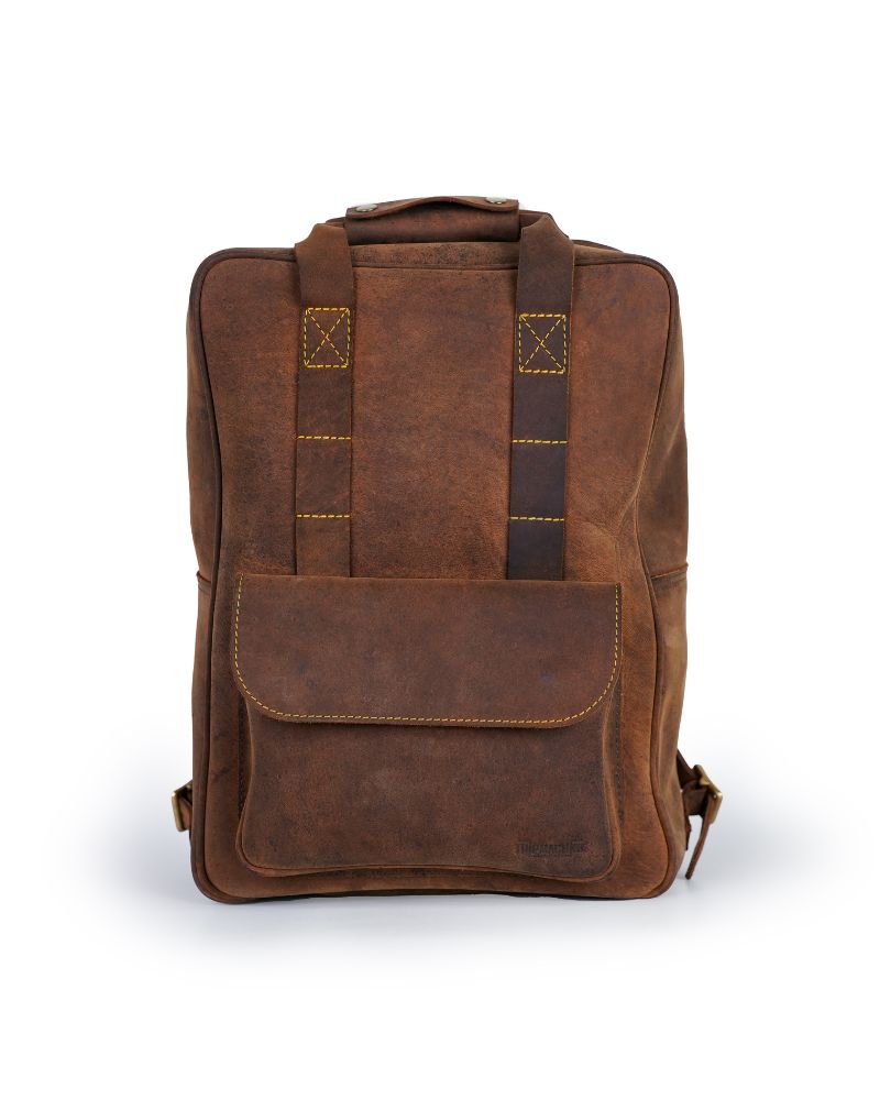 Front view of handmade genuine leather brown color eastwood backpack with white background