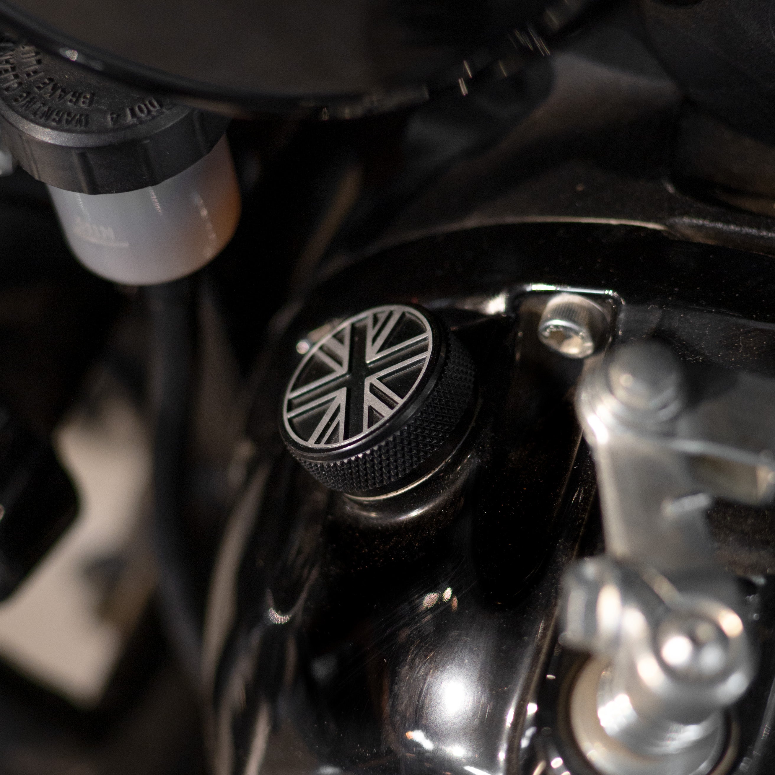 Close-up of a motorcycle engine with a Union Jack oil filler cap