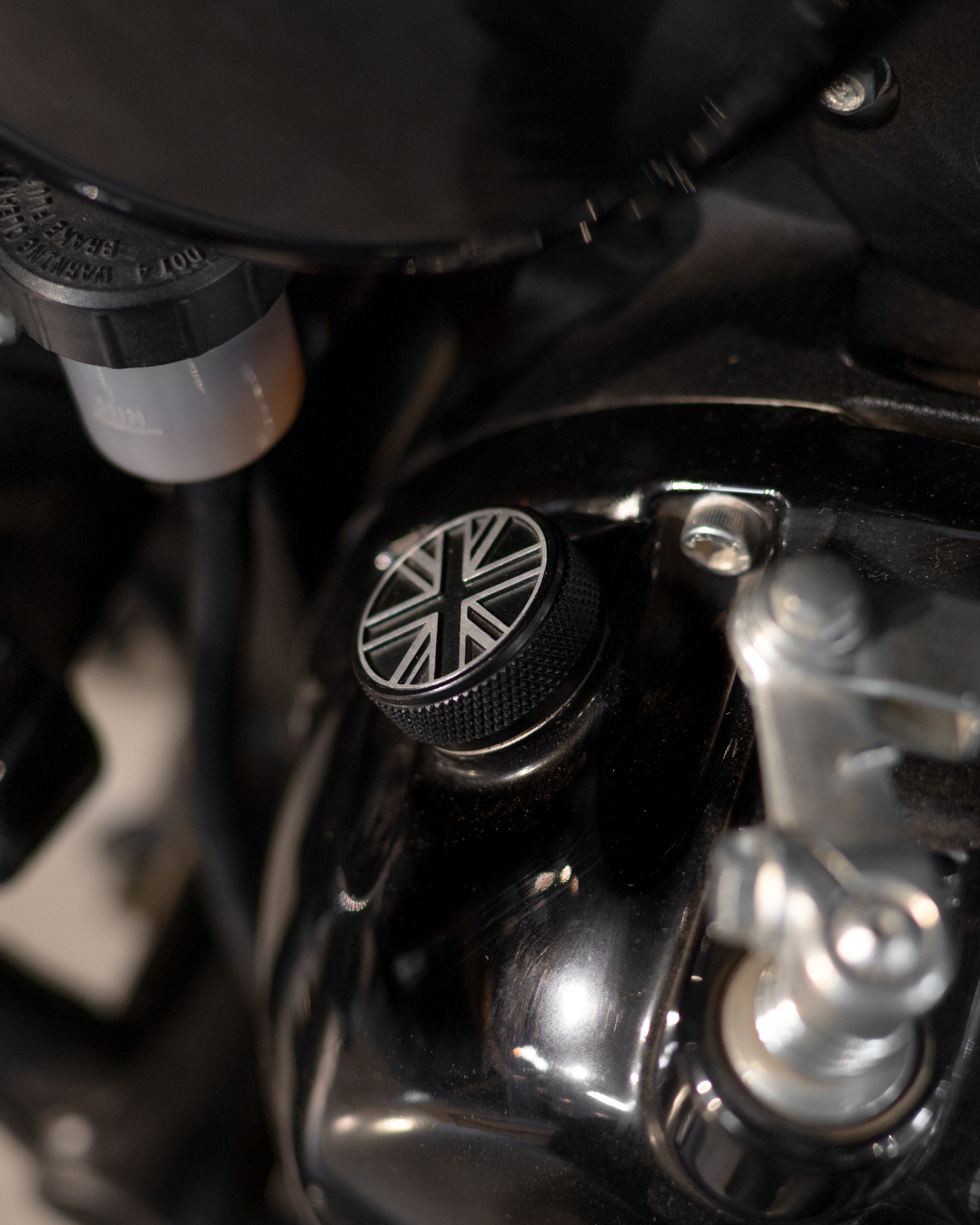 Close-up of a motorcycle engine with a Union Jack oil filler cap