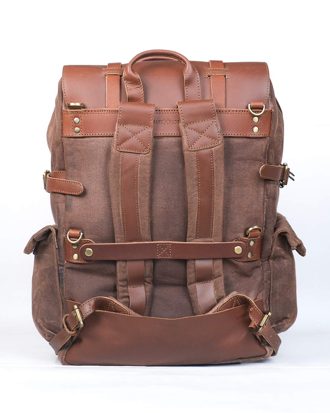 Brown leather backpack on a white background