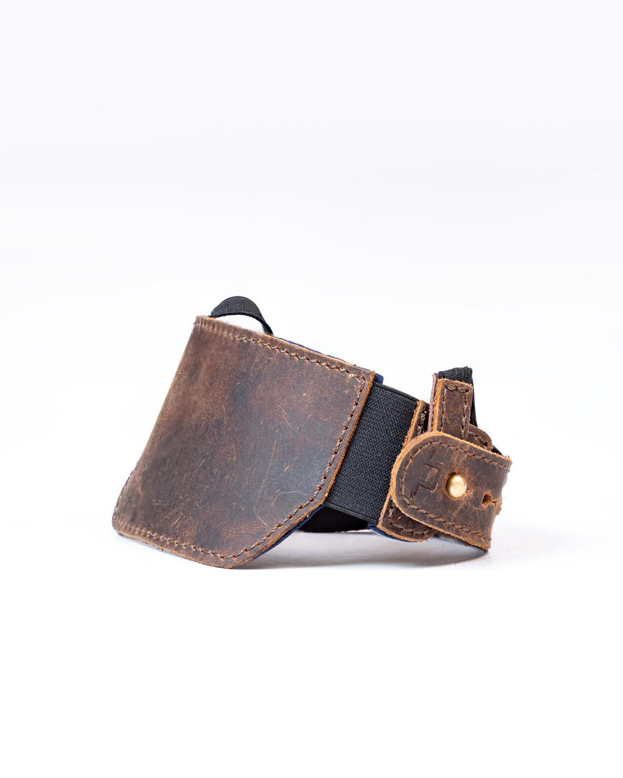 Brown leather shoe protector on a white background