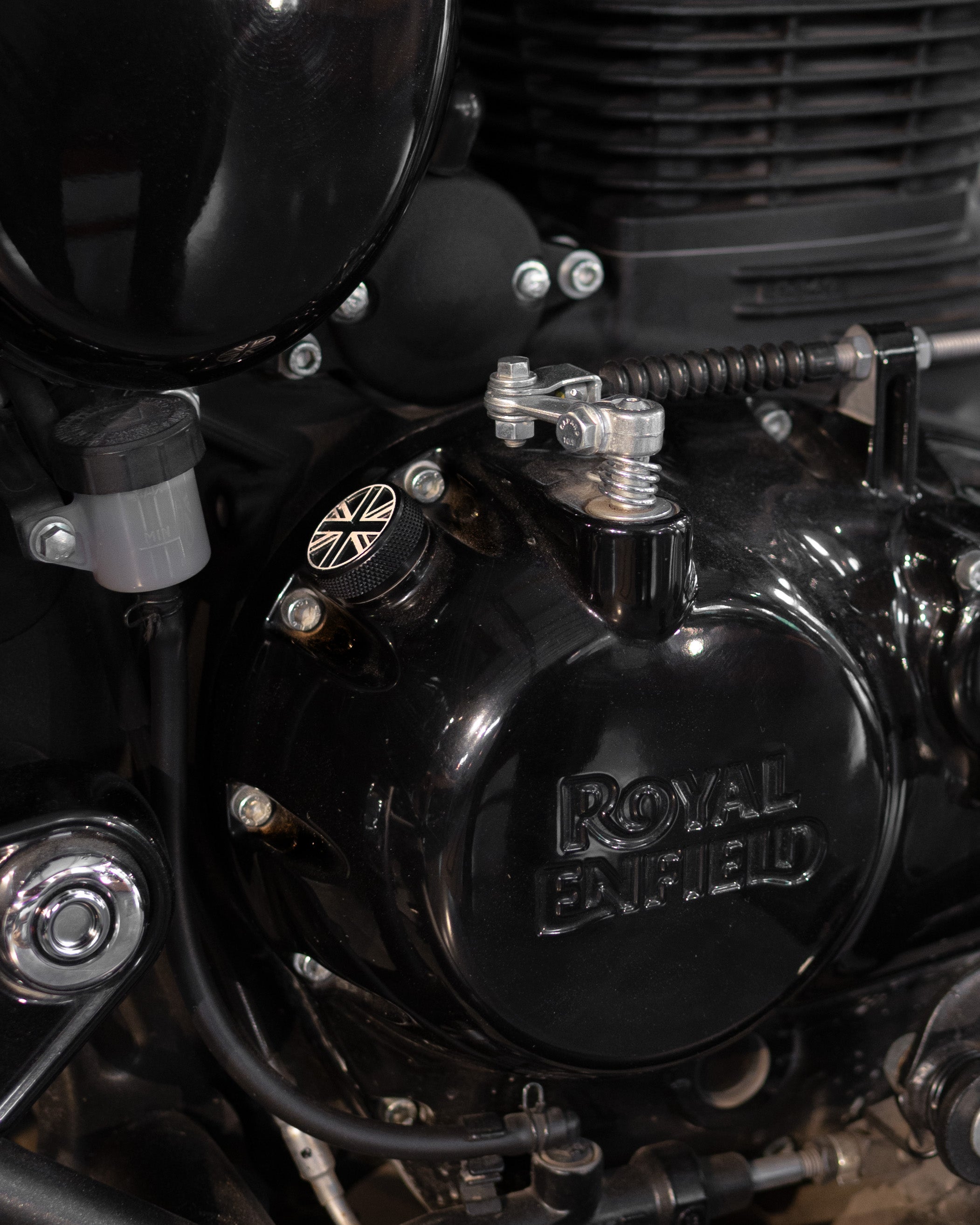 Close-up of a Royal Enfield motorcycle engine with oil filler cap