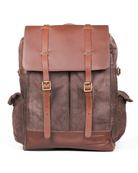 Brown leather backpack with straps on a white background