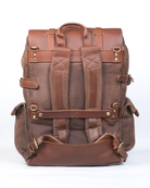 Brown leather backpack on a white background