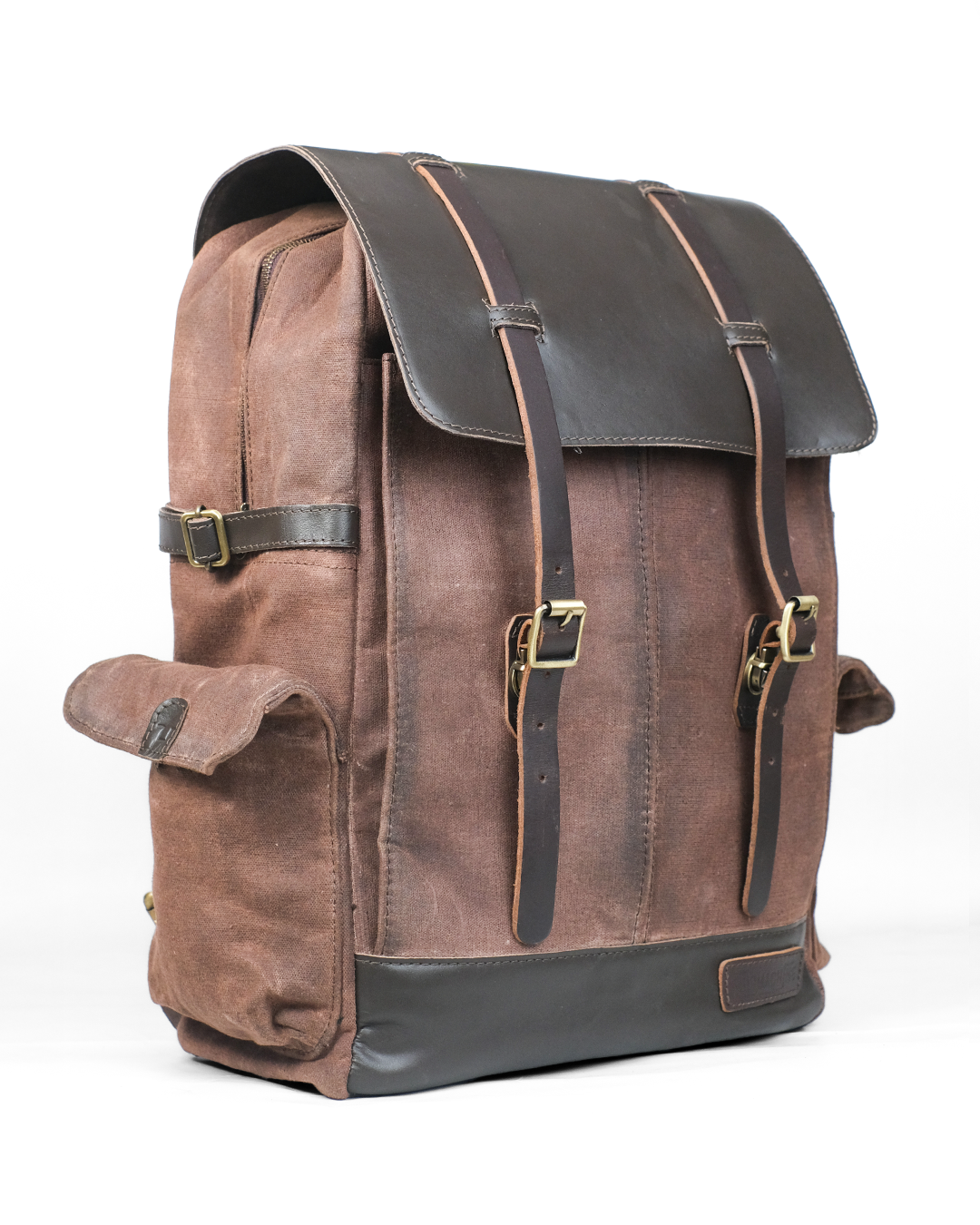 Brown leather backpack with black accents on a white background