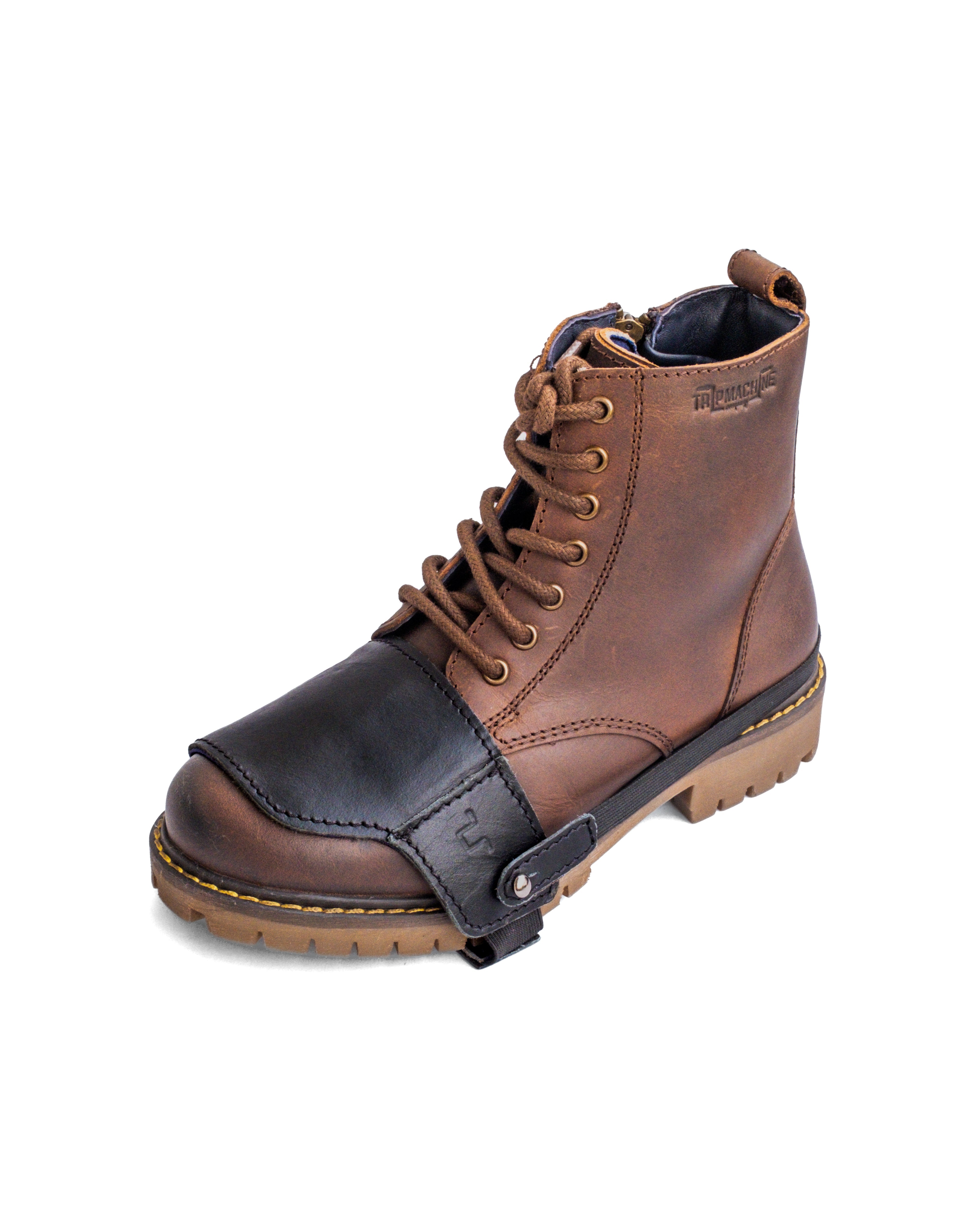Brown leather boot with black patch on a white background